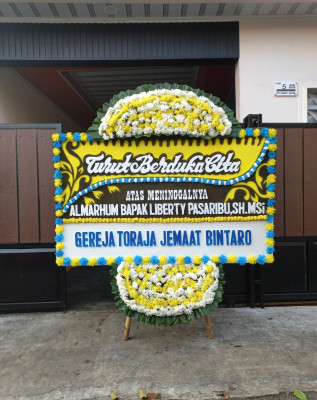 Papan Bunga Duka di Bulu